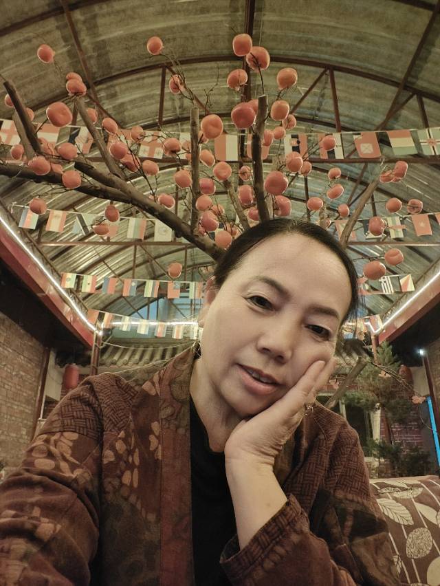 何阿姨照片